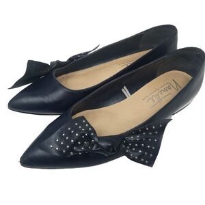 Annette Studio by Nanette Lepore. Cute flats with silver studded bow.